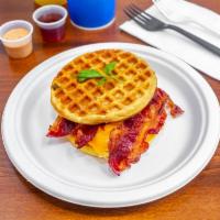 Bacon, Egg and Cheese Waffle Sandwich · Beef bacon, eggs, cheddar cheese on waffle.