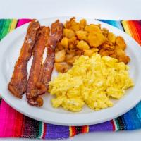 2 Eggs Any Style · Served with home fries, toast, sausage, ham or bacon. Servido con papas de la casa, tostada,...