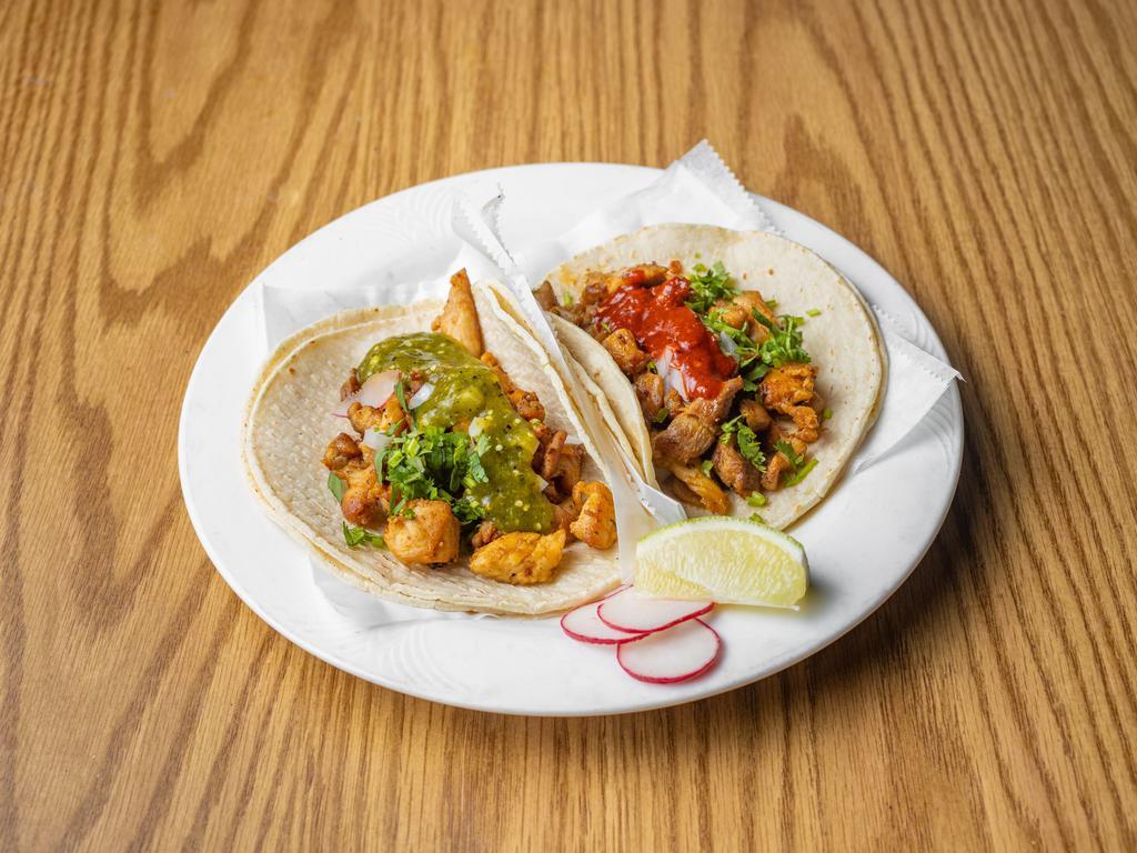 Roasted Chicken Taco · served with onion and cilantro 