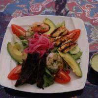 Mix Salad  · Chicken, shrimp, and steak served with cucumber, tomato, romain salad, avocado, and red pick...
