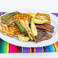 Parrillada Mixta Platter · Chicken, steak, pork chop, mexican chorizo, fried cheese, avocado, onion compray, red pepper...
