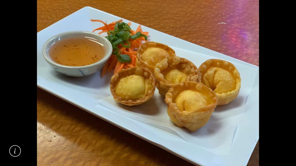 1. Crab Rangoon · 4 pieces. Imitation crabmeat with cream cheese and celery wrapped in wonton skin.