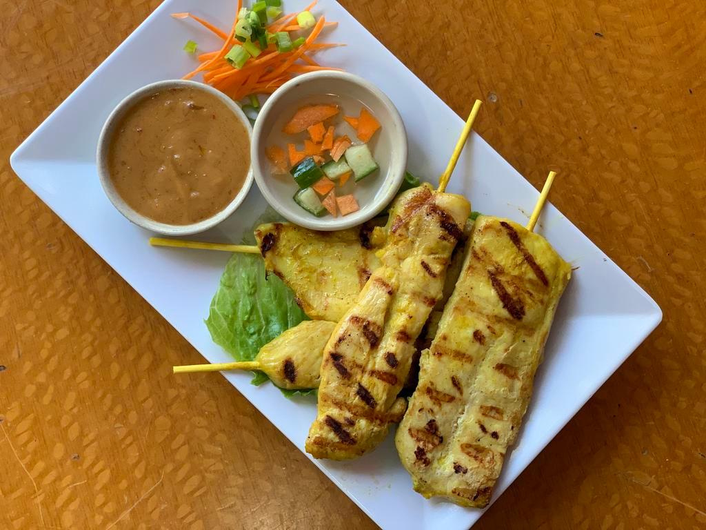 6. Chicken Satay · 4 pieces. Chicken tenders on a skewer comes with spicy peanut sauce and cucumber relish.
