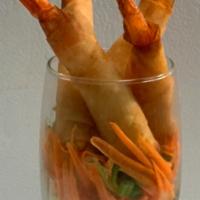 8. Shrimp Roll · 4 pieces. Shrimp wrapped with spring roll sheet deep fried with sweet dipping sauce.