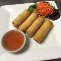 15. Vegetable Spring Roll · 4 pieces. Vegetable spring roll that is fried and stuffed with cabbage, carrot and glass noo...