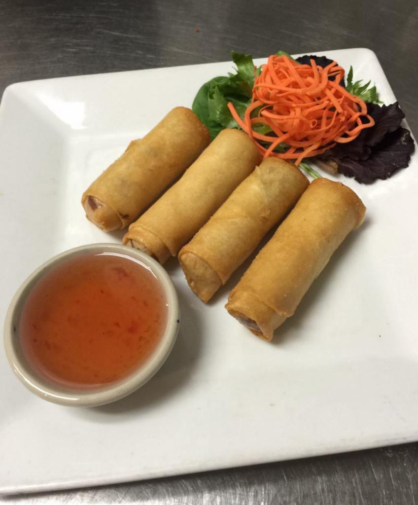15. Vegetable Spring Roll · 4 pieces. Vegetable spring roll that is fried and stuffed with cabbage, carrot and glass noodles. Served with plum sauce.