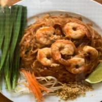 31. Pad Thai · Famous Thai's stir fried rice noodles, scallion, bean sprout, peanut and egg.