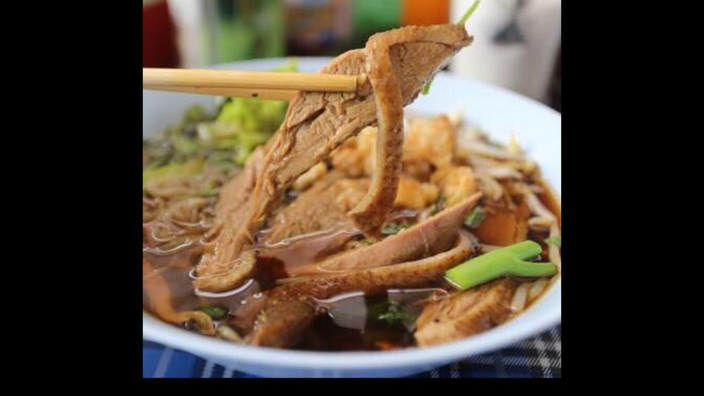 40. Duck Noodle Soup · Duck broth noodle soup with Asian broccoli, scallions and fried onion with choice of thin noodles, flat noodles, angel hair or egg noodles.