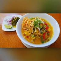 45. Khao Soi Noodle · Curry and coconut flavored noodle soup, served with egg noodles.