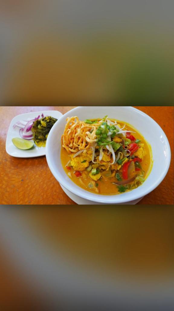 45. Khao Soi Noodle · Curry and coconut flavored noodle soup, served with egg noodles.