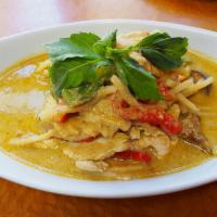55. Green Curry · Hot and slightly sweet curry in the mix with coconut milk, eggplant, bamboo shoot, basil and...