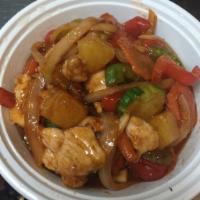 67. Pad Sweet and Sour · Pineapple, bell pepper, scallions, cucumber, tomato and sweet sour sauce.served with jasmine...