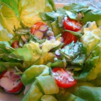 Garden Salad · Served with homemade garlic knots and dressing.