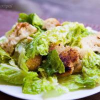 Caesar Salad · Served with homemade garlic knots and dressing.