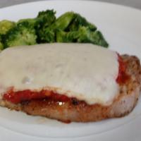 Pork Chop alla Pizzaiola · Pork Loin Chop Smothered in a Tasty Chunky Tomato Sauce, Topped with Mozzarella Cheese and S...