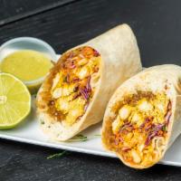 Curry Chicken Tinga Burrito · Slow-braised chicken breast in Chipotle in Adobo and various seasonings, then wok tossed wit...