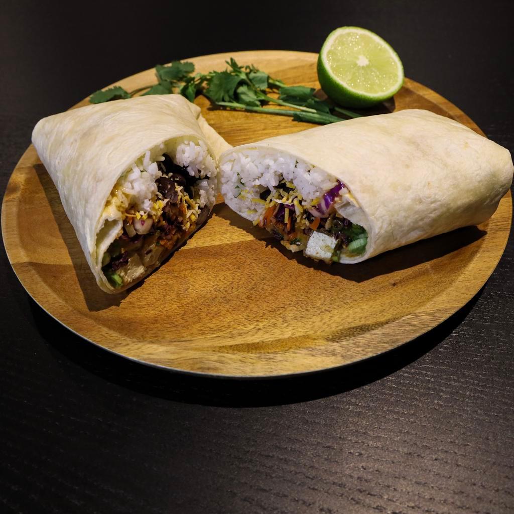 Tofu BBQ Burrito · Fried tofu coated in our BBQ sauce. Wrapped with rice, Sweet Potato Noodles (Chap-Chae), Avocado, and Asian slaw.  Choice of Sauce/Salsa on side