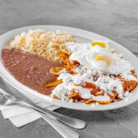 Chilaquiles Rojos  · Deep fried tortilla chips covered in our tomatillo and guajillo red sauce, topped with onion...