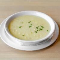 Avgolemono Soup · A classic Greek soup made with egg, lemon, chicken, and orzo.