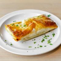 Spanakopita Appetizer · spinach and feta cheese wedged between layers of phyllo pastry and baked to a golden brown
...