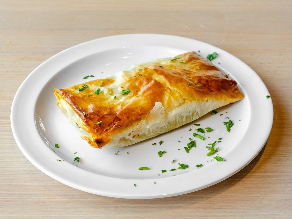 Spanakopita Appetizer · spinach and feta cheese wedged between layers of phyllo pastry and baked to a golden brown
*VEGETARIAN*