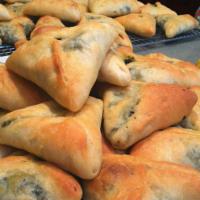 Spinach Pies  · 4 pieces. Fresh baked dough with spinach, onions, and lemon juice. 