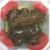 Veggies Grape Leaves  · 5 pieces. Grape leaves stuffed with rice and vegetables served cold. 