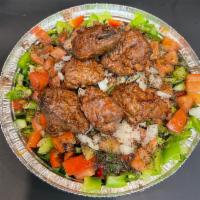 Beef kabob Salad · Beef Kabob and fresh crisp greens with feta cheese and olives covered in our traditional hou...