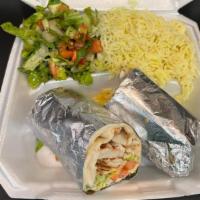 Chicken Shawarma Wrap · Thin sliced seasoned chicken served with garlic sauce, lettuce, and tomatoes. 
