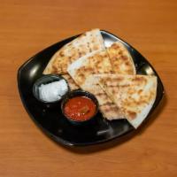 Cheese Quesadilla  · Monterey Jack, cheddar and mozzarella cheese. Served with salsa and sour cream.