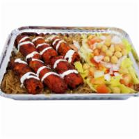 Kofta Kebab Over Rice Platter · Kofta kabab over rice, choice of toppings, sauces, and extras.