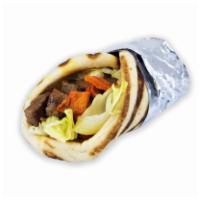 Combo Gyro · Lamb & Chicken Served on pita with choice of salad and any shahs sauces.
