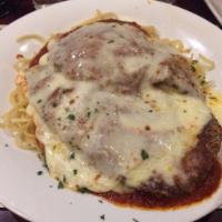 Chicken Parmigiana · Made or covered with Parmesan cheese.