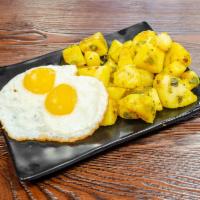 8. Papas de la Casa, Huevos al Gusto · Homemade potatoes with eggs any style.