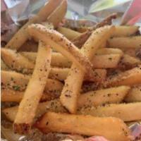 French Fries · Cut potatoes fried and salted to perfection. Vegan.