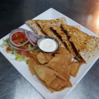 Chorizo Quesadilla · Spicy Mexican sausage and cheese. salsa and sour cream on the side