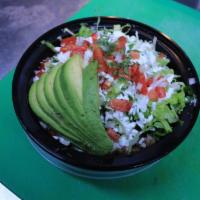 Carne Asada Burrito Bowl · Marinated steak.