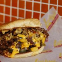 Hell's Kitchen Style Burger · Angus beef chili, jalapenos, cheddar cheese sauce and chipotle mayo.