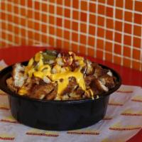 Lucky's Loaded Fingers · Crinkle cut fries, Angus beef chili, bacon, diced onions, jalapenos and sour cream topped wi...