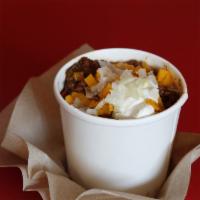 Lucky's Beef Chili · Cheddar cheese and sour cream.