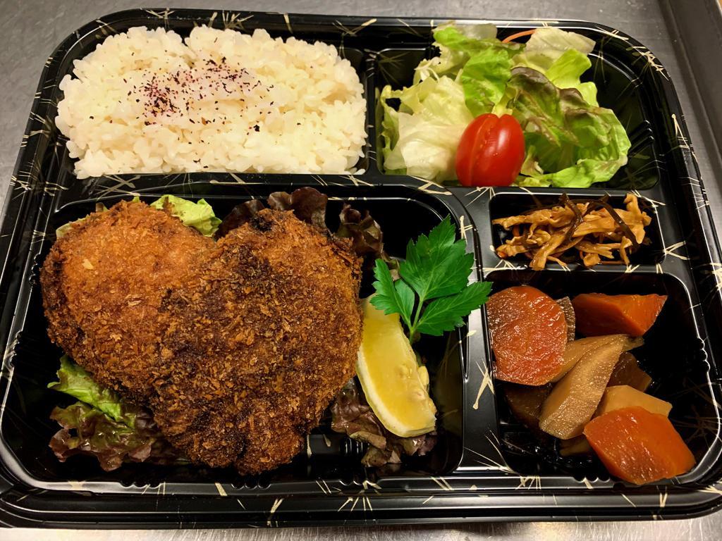 Menchi Katsu  · Fried ground beef cutlet made with cabbage, onion, and egg. Comes with simmered root vegetables and green salad.