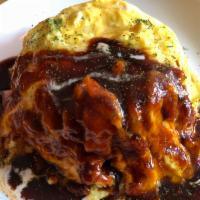 Omu-Rice · Chicken and onion fried rice wrapped in egg omelette. 
Demi-glace sauce and slight heavy cre...