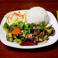 C73. Broccoli Beef Combo Plate · Served with 3 pieces of potstickers and salad. Served with plain fried rice.