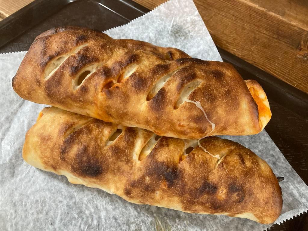 Sausage Roll · Sausage, pepper, and mozzarella cheese.