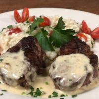 Steak on Gorgonzola Sauce · Gorgonzola sauce and vegetables served with a choice of one side