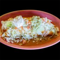 Potrillo Burrito · Flour tortilla with your choice of protein, with rice, choice of beans, and our special burr...