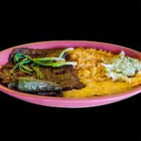 Carne Asada · Skirt steak, flame broiled to your taste with green onion, jalapeno pepper and guacamole. Se...