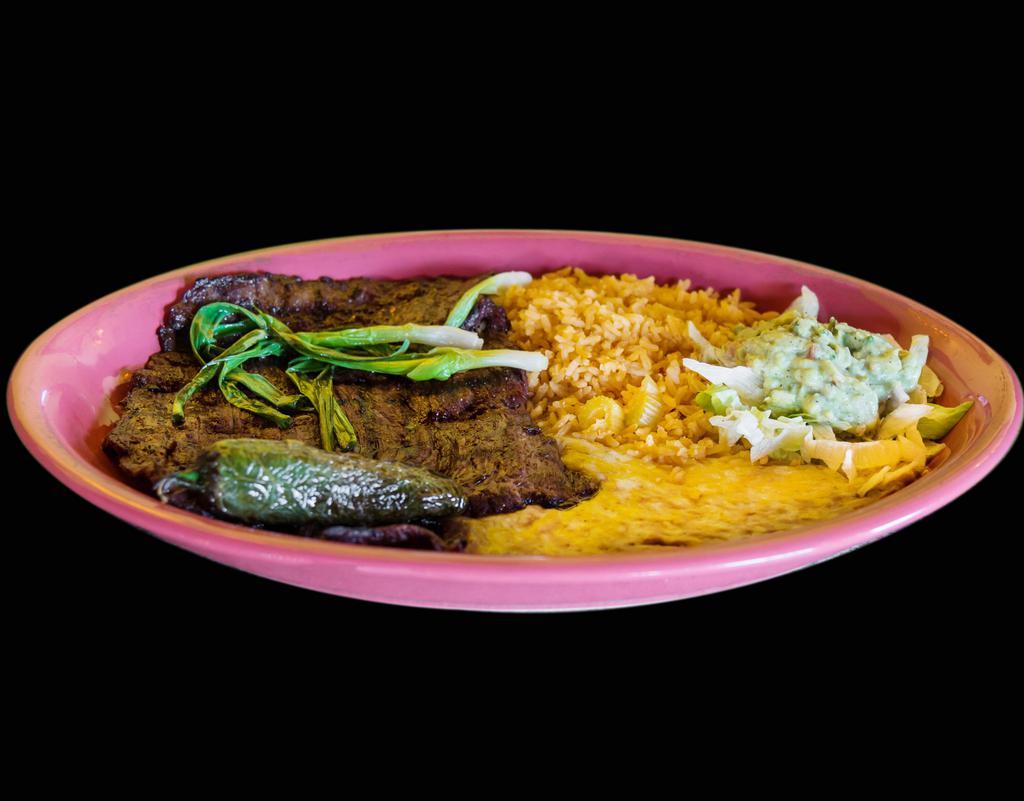 Carne Asada · Skirt steak, flame broiled to your taste with green onion, jalapeno pepper and guacamole. Served with rice and beans.