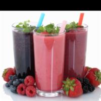 1. Tropical Paradise · Non-fat yogurt, pineapple, strawberries, banana and orange juice.