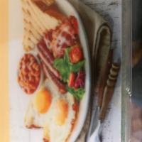 Full Irish Breakfast · 2 eggs, Irish bacon, sausage, black and white pudding, grilled tomato, potato, Irish baked b...